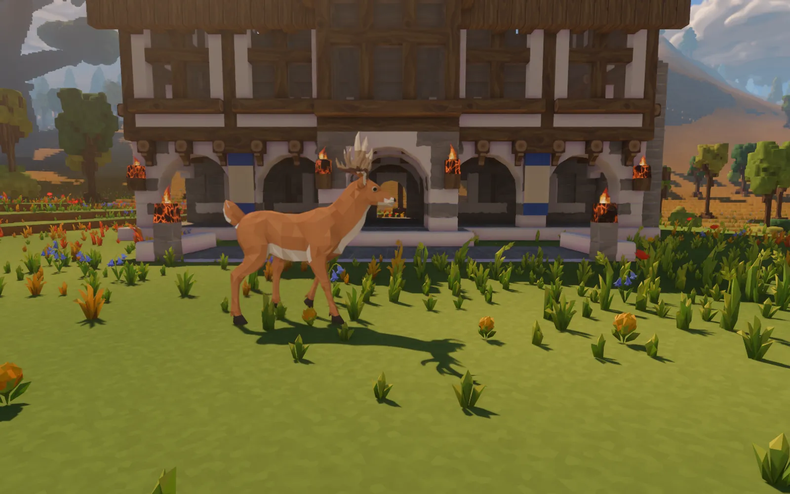 A faceted chestnut deer with pale belly and branching antlers walking across the flowered green before the timber town hall.