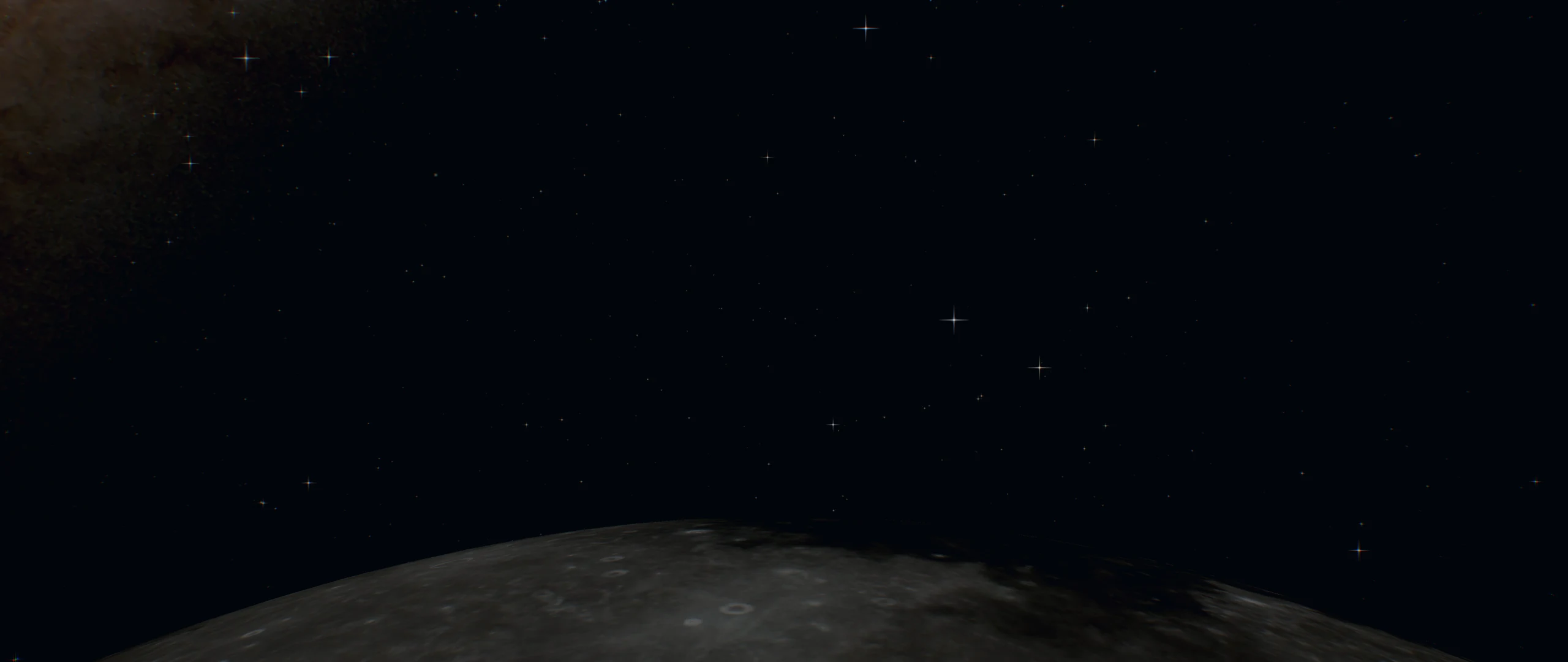 The Moon's limb against the stars, its night side faint in earthlight