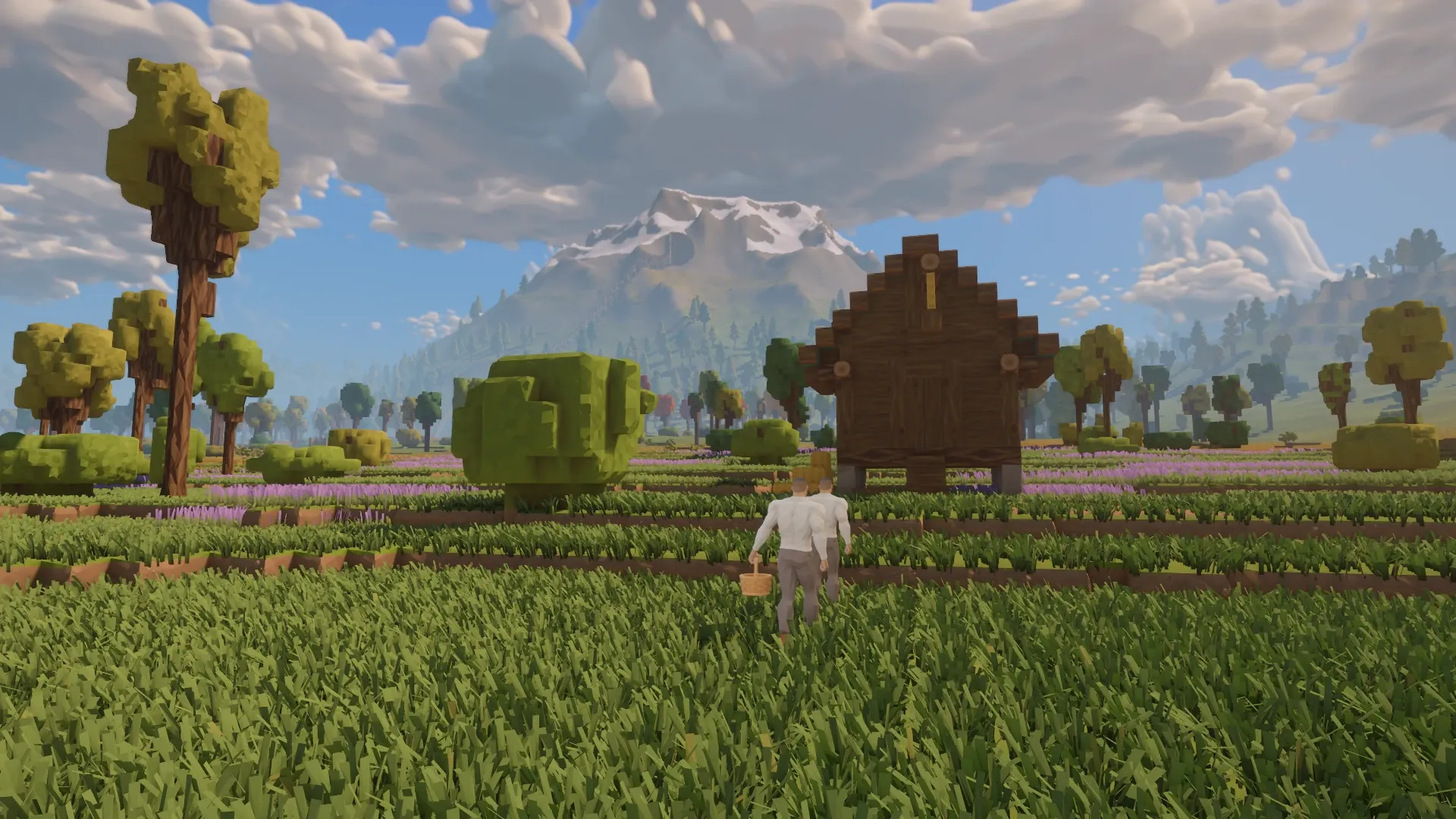 After the skyline update, the same view of the traveller and granary reveals the snow-covered mountain and wooded slopes behind them.